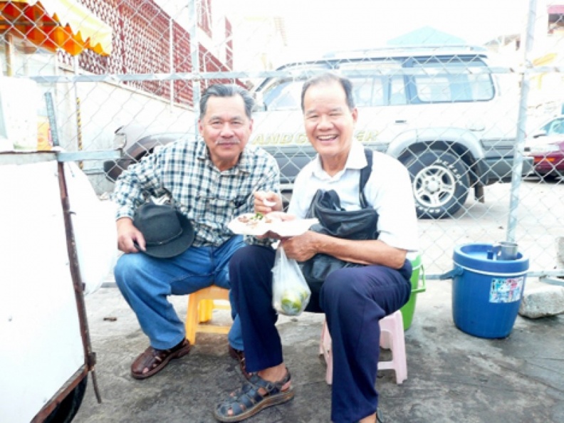 Vũ Trung Hiền and Vu Ngoc Chau, blood brothers sharing breakfast at a street vendor in Phnom Penh, Cambodia in April 2012.
In 1957 all foreign Workers had to leave Vietnam due to government policy.
At that time, (1957), Vu Trung Hien, the brother of Chau Ngoc Vu, became
the Overseer of Vietnam from 1957 until 2010, when Canadian Overseers put him out of the work.
They claimed that he owned a home (which his brother owned).
He was allowed to re-enter the work as a junior Worker after the home was sold.
Hien & Chau, brothers _.jpg